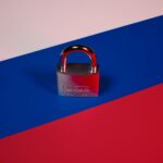 a padlock on a red, blue, and pink background