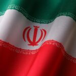 High-quality image of the Iranian national flag waving to symbolize patriotism and national pride.
