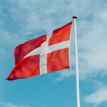 white and red flag on pole